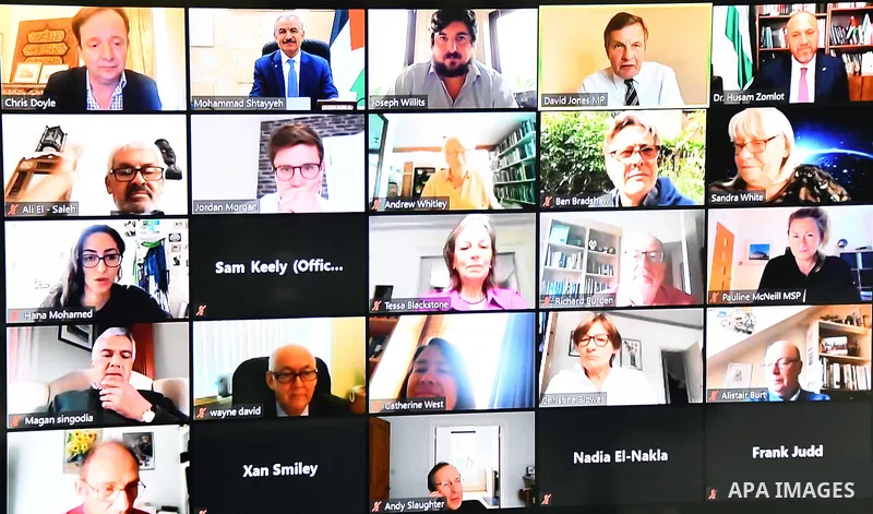 Palestinian Prime Minister Mohammad Ishtayeh, meets with British parliamentarians via a video link, in the West Bank city of Ramallah, on June 29, 2020. Photo by Prime Minister Office