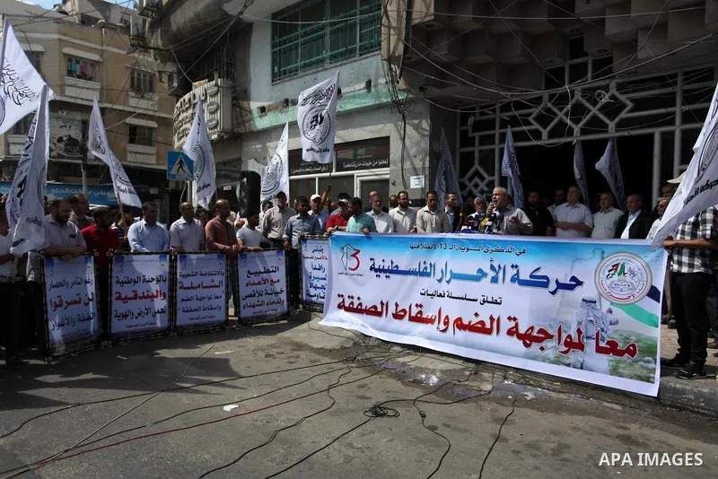 Palestinian supporters of Al-Ahrar movement, take part in a protest against Israel's plans to annex parts of the occupied West Bank, in Gaza city, on June 30, 2020. Israel aims to begin a process of annexing West Bank se...
