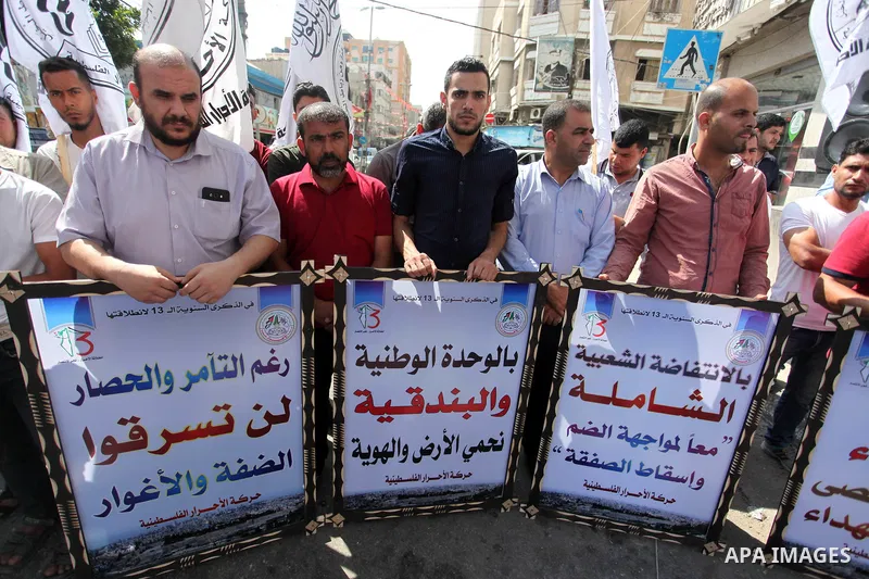 Palestinian supporters of Al-Ahrar movement, take part in a protest against Israel's plans to annex parts of the occupied West Bank, in Gaza city, on June 30, 2020. Israel aims to begin a process of annexing West Bank se...