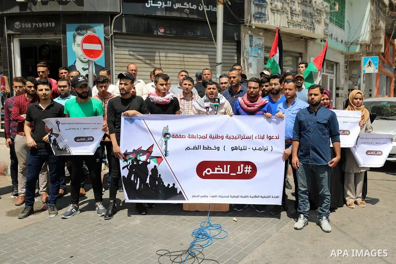 Palestinian protesters take part in a protest against Israel's plans to annex parts of the occupied West Bank, in Gaza city, on June 30, 2020. Israel aims to begin a process of annexing West Bank settlements and the Jord...