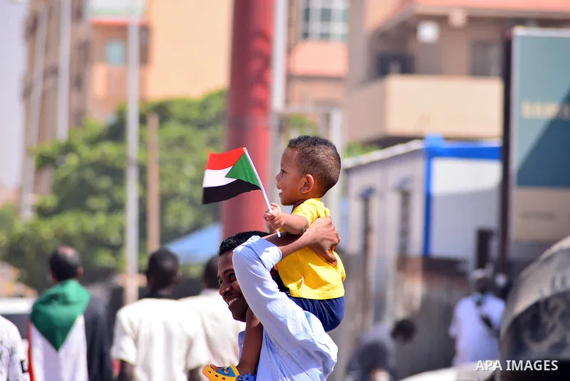Sudanese protesters chant during a protest on Sixty street in the east of the capital Khartoum, on June 30, 2020. Tens of thousands of Sudanese took to the streets in several cities and the capital calling for reforms an...