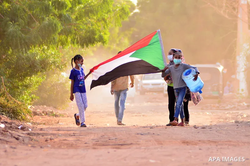 Sudanese protesters chant during a protest on Sixty street in the east of the capital Khartoum, on June 30, 2020. Tens of thousands of Sudanese took to the streets in several cities and the capital calling for reforms an...