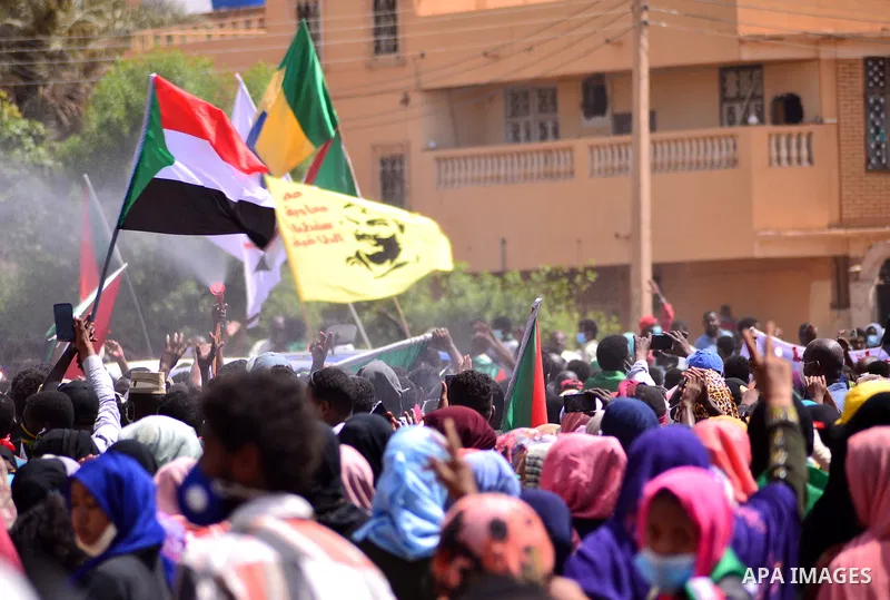 Sudanese protesters chant during a protest on Sixty street in the east of the capital Khartoum, on June 30, 2020. Tens of thousands of Sudanese took to the streets in several cities and the capital calling for reforms an...