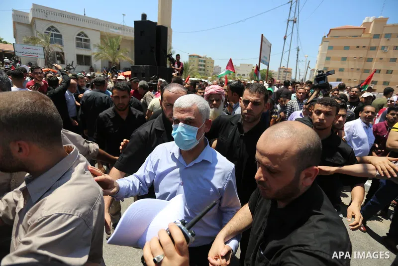 Hamas leader in the Gaza Strip Yahya Sinwar, wearing protective face mask attends a demonstration against Israel's West Bank annexation plans in Gaza City on July 1, 2020. Israel's Prime Minister Benjamin Netanyahu, embo...