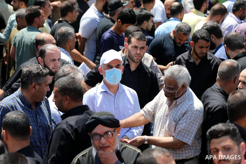 Hamas leader in the Gaza Strip Yahya Sinwar, wearing protective face mask attends a demonstration against Israel's West Bank annexation plans in Gaza City on July 1, 2020. Israel's Prime Minister Benjamin Netanyahu, embo...