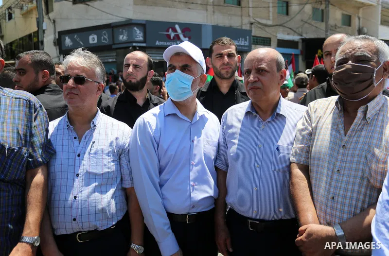 Hamas leader in the Gaza Strip Yahya Sinwar, wearing protective face mask attends a demonstration against Israel's West Bank annexation plans in Gaza City on July 1, 2020. Israel's Prime Minister Benjamin Netanyahu, embo...
