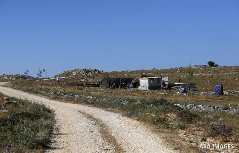 An Israeli settler puts caravans, at the Asira town north the West Bank city of Nablus on, on July 1, 2020. Under the pretext of controlling the lands near Joshua bin Nun. Joshua ben nun, of the tribe of ephraim, was the...