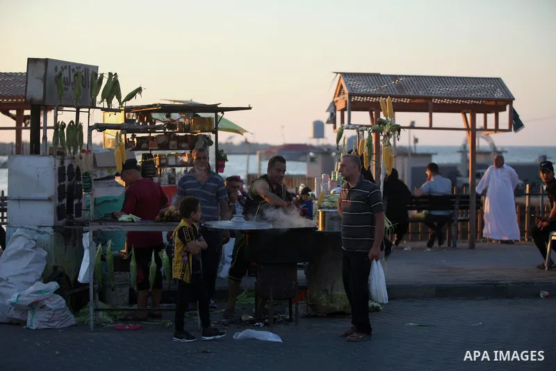 Palestinians enjoy at Gaza seaport after its reopening as the coronavirus disease (COVID-19) restrictions ease in Gaza City July 3, 2020. Photo by Mahmoud Ajjour