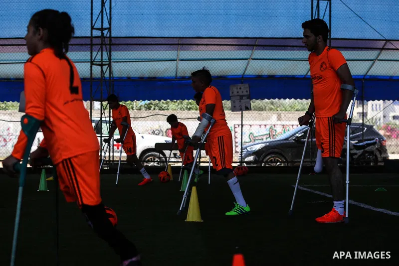 Disabled Palestinians who lost their legs, take part in the Football training, organized by the Palestine Association of the Football amputation and International Committee of the Red Cross, in Dair Al Balah in the centr...