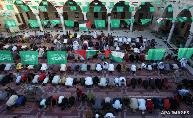 Palestinian muslims attend the prayer of Eid al-Adha or the feast of sacrifice in Gaza city, on July 31, 2020. Muslims around the world are celebrating Eid al-Adha, the "Feast of Sacrifice", which marks the end of the an...