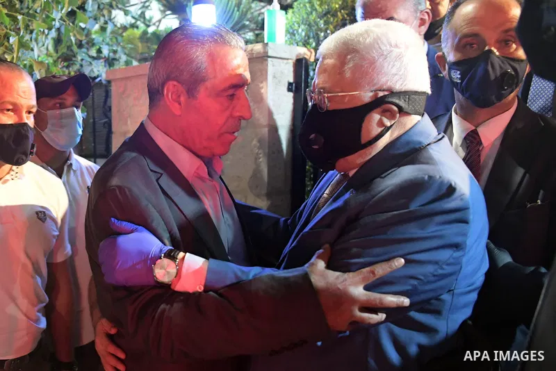 Palestinian President Mahmoud Abbas, condolences member of the Central Committee of the Fatah movement Hussein Sheikh, in the West Bank city of Ramallah, on August 6, 2020. Photo by Thaer Ganaim