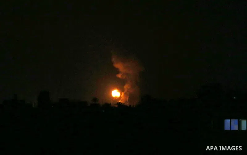 Flame and smoke are seen during an Israeli air strike, in Khan Younis in the southern Gaza Strip, on August 16, 2020. Photo by Ashraf Amra