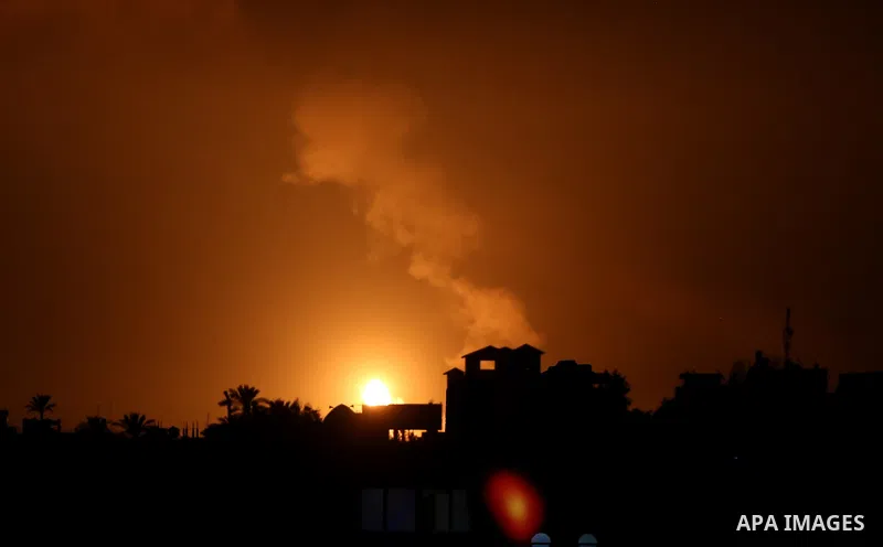 Flame and smoke are seen during an Israeli air strike, in Khan Younis in the southern Gaza Strip, on August 16, 2020. Photo by Ashraf Amra