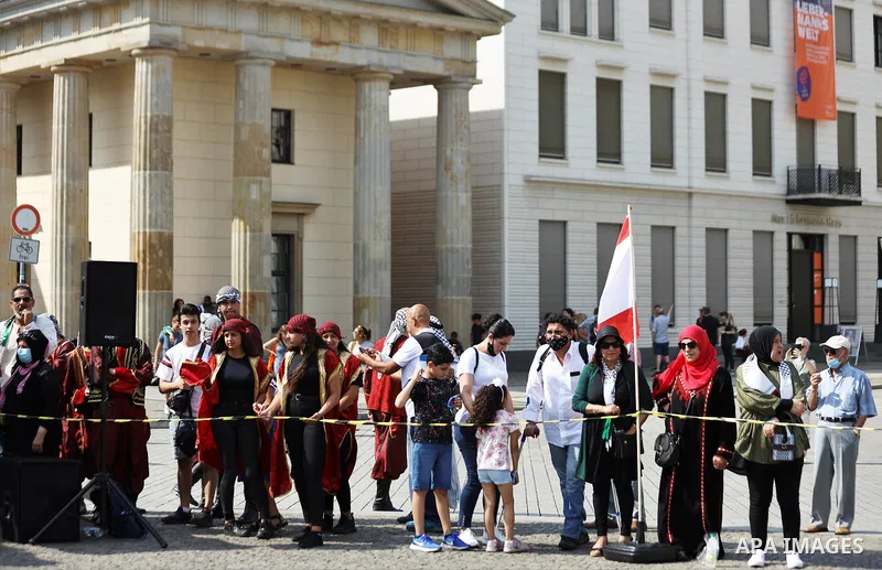 Palestinians and foreigners take part in a protest against the United Arab Emirates' deal with Israel to normalise relations, in front of the American embassy, in Berlin, Germany, on August 15, 2020. Photo by Manar Shahi...