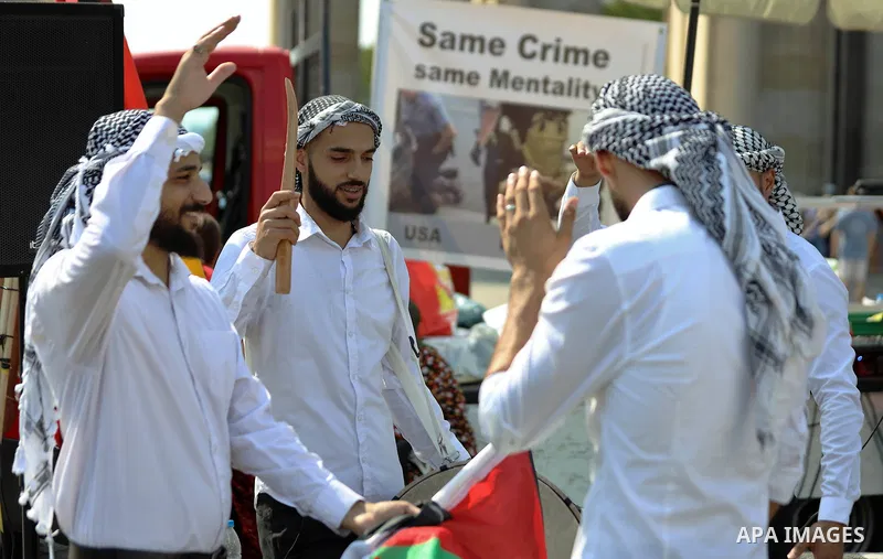 Palestinians and foreigners take part in a protest against the United Arab Emirates' deal with Israel to normalise relations, in front of the American embassy, in Berlin, Germany, on August 15, 2020. Photo by Manar Shahi...