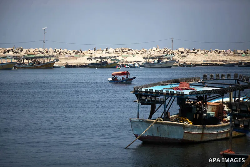 Fishing boats are seen in the Gaza seaport, on August 16, 2020. The Israeli government said late Wednesday that the fishing zone off the coast of Gaza had been closed, in retaliation for the launch of incendiary balloons...