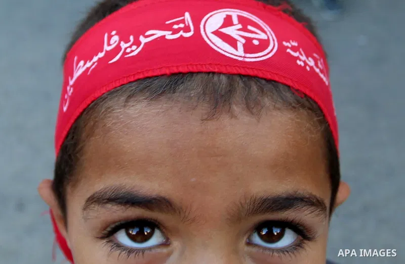 Palestinian supporters of the Popular Front for the Liberation of Palestine take part in a protest against the United Arab Emirates' deal with Israel to normalise relations, in Khan Younis in the southern Gaza Strip on A...