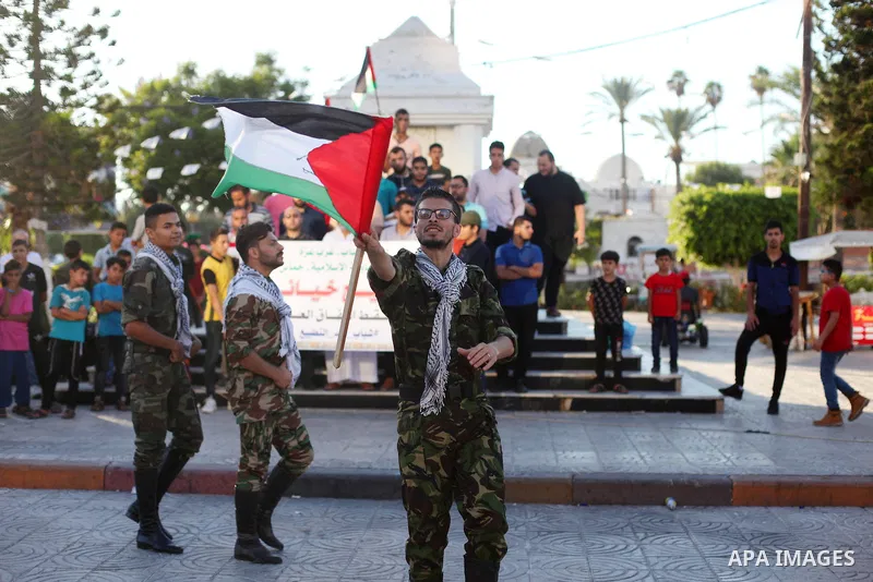 Members of Palestinian dance Dabka band perform during protest against the United Arab Emirates' deal with Israel to normalise relations, in Gaza city, on August 20, 2020. Photo by Mahmoud Ajjour