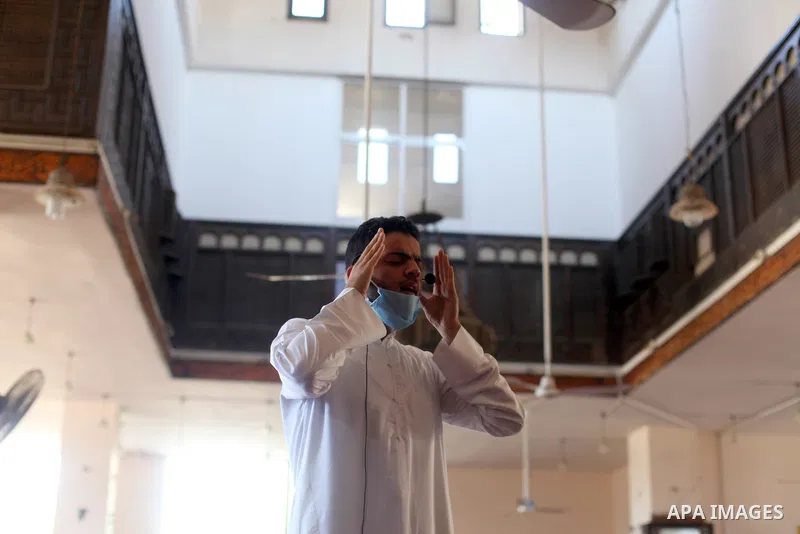 Palestinian imam who calls Muslims to prayer at a mosque is empty of worshipers during the imposed lockdown to mitigate virus outbreak in the Gaza Strip, in Gaza city on August 28, 2020, during a lockdown in the Palestin...
