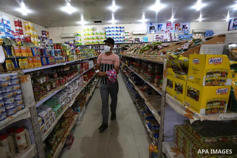 Palestinians wear protective face masks, as they shop during a lockdown following the outbreak of the coronavirus disease (COVID-19), at a market, in Dair Al Balah in the central of Gaza Strip, on September 6, 2020. Phot...