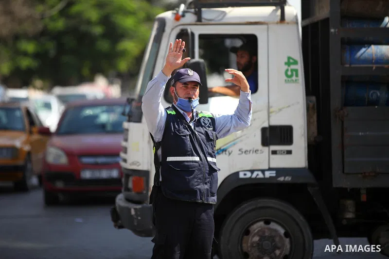 Palestinian policeman wearing a face mask in Gaza City on October 05, 2020. after the easing of restrictions due to the COVID-19 pandemic. Photo by Mahmoud Ajjour