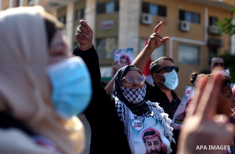 Palestinians take part in a protest to solidarity with prisoner Maher Al-Akhras on hunger strike helds in Israeli jails, in front of Red Cross office, in Gaza city, on October 19, 2020. Photo by Mahmoud Ajjour