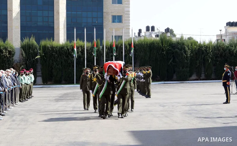 Palestinian honour guard carrying the coffin of late Palestinian chief negotiator Saeb Erekat during his funeral procession in the West Bank city of Ramallah on November 11, 2020. Palestinian veteran negotiator Saeb Erek...