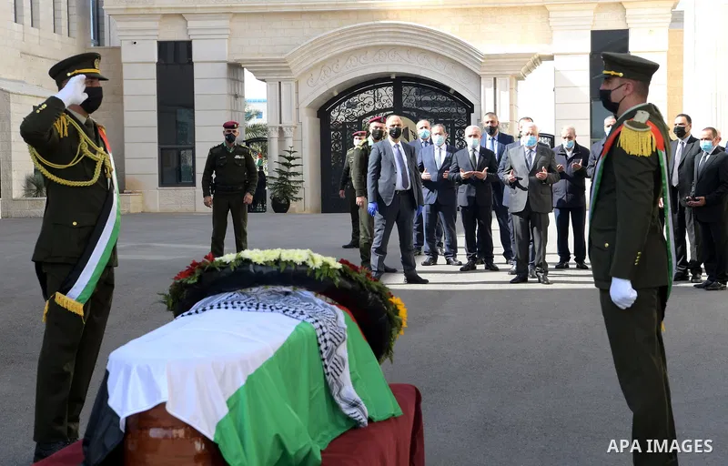 Palestinian president Mahmud Abbas praying among others at the funeral of late Palestinian official Saeb Erekat in the West Bank city of Ramallah on November 11, 2020. Palestinian veteran negotiator Saeb Erekat died of c...