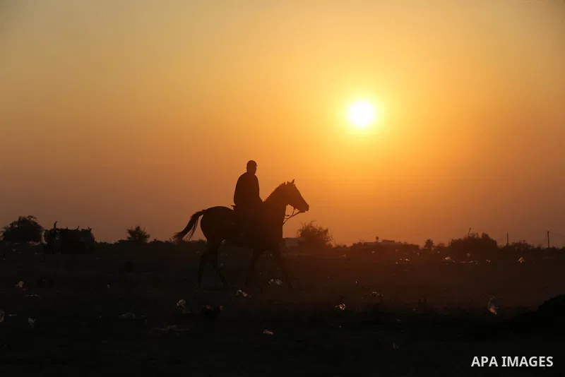 Palestinian competitors take part in a race on the former international airport, in the southern city of Rafah, on November 20, 2020. Photo by Ashraf Amra