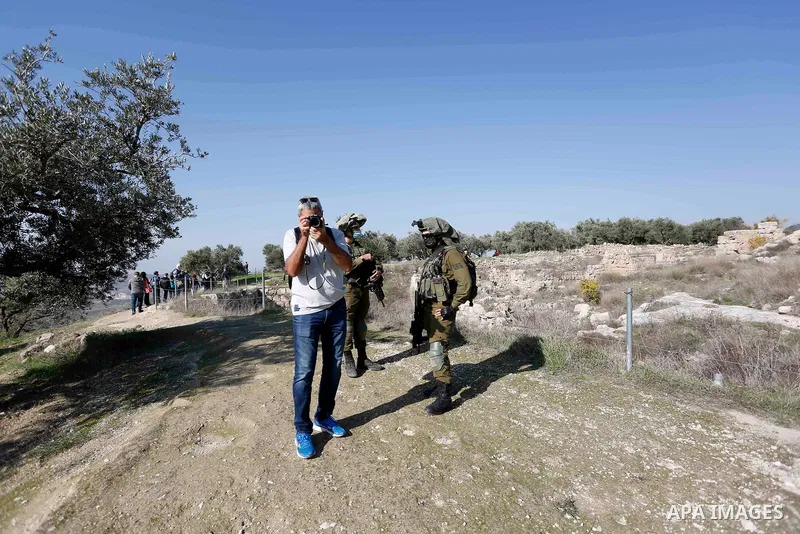 Israeli settlers visit the Roman basilica and forum in the village of Sebastia near the West Bank city of Nablus, on December 2, 2020. The ancient town of Sebastia is one of the greatest archaeological sites of the Holy...