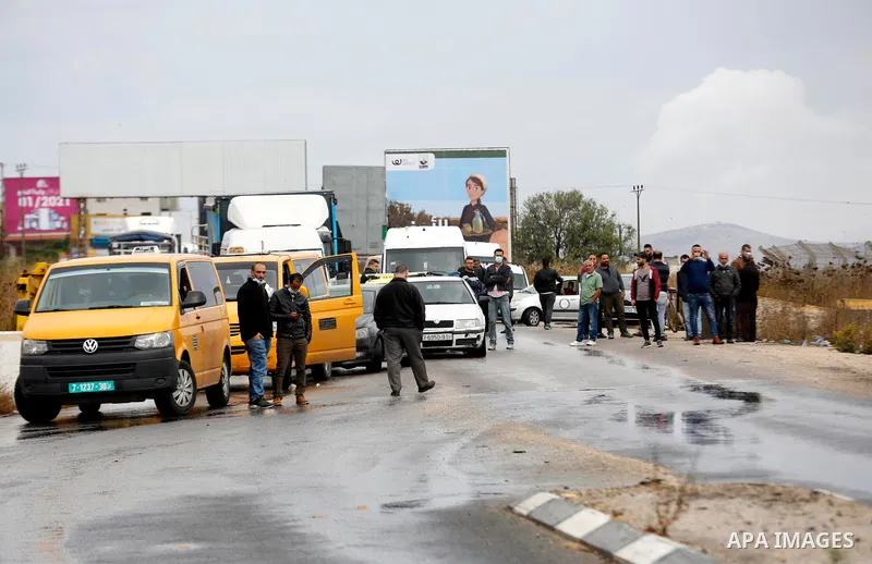 Israeli soldiers gather at a checkpoint near Nablus in the occupied West Bank where a Palestinian who shot at Israeli troops on November 4, 2020 was killed when soldiers returned fire, Israel's army said. Photo by Shadi...