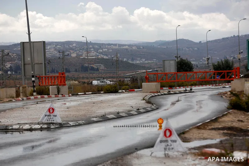 Israeli soldiers gather at a checkpoint near Nablus in the occupied West Bank where a Palestinian who shot at Israeli troops on November 4, 2020 was killed when soldiers returned fire, Israel's army said. Photo by Shadi...
