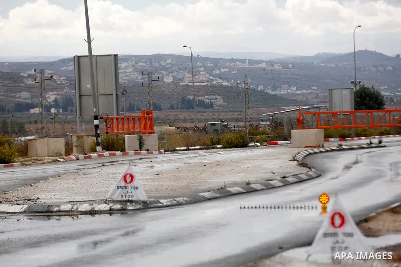 Israeli soldiers gather at a checkpoint near Nablus in the occupied West Bank where a Palestinian who shot at Israeli troops on November 4, 2020 was killed when soldiers returned fire, Israel's army said. Photo by Shadi...