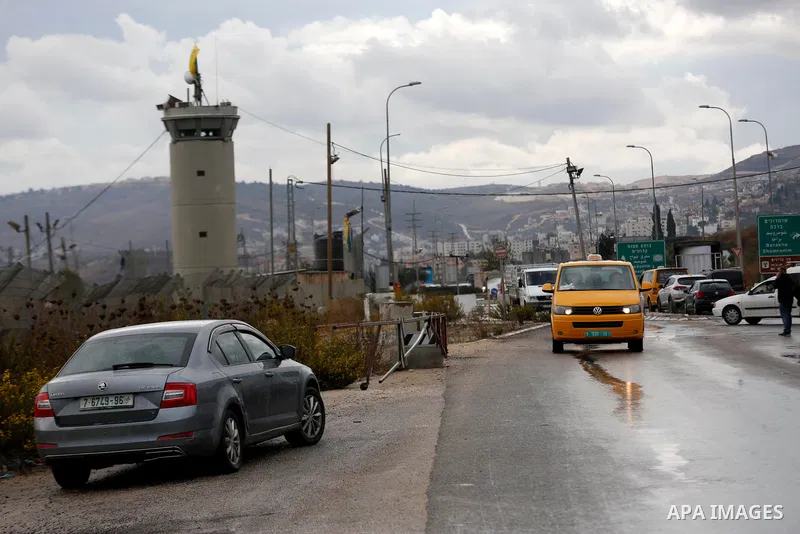 Israeli soldiers gather at a checkpoint near Nablus in the occupied West Bank where a Palestinian who shot at Israeli troops on November 4, 2020 was killed when soldiers returned fire, Israel's army said. Photo by Shadi...