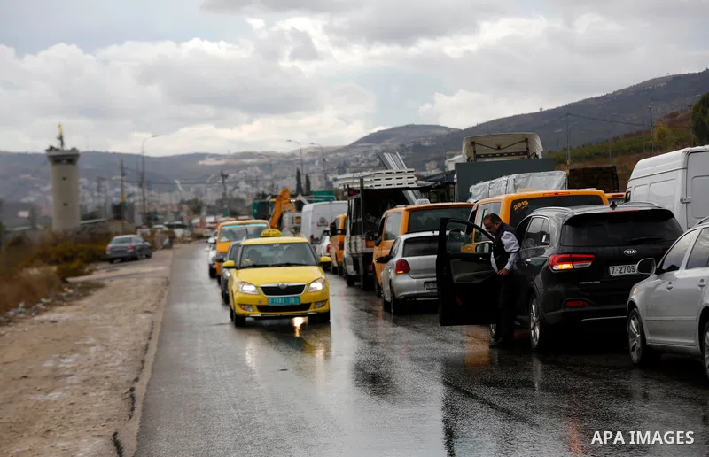 Israeli soldiers gather at a checkpoint near Nablus in the occupied West Bank where a Palestinian who shot at Israeli troops on November 4, 2020 was killed when soldiers returned fire, Israel's army said. Photo by Shadi...