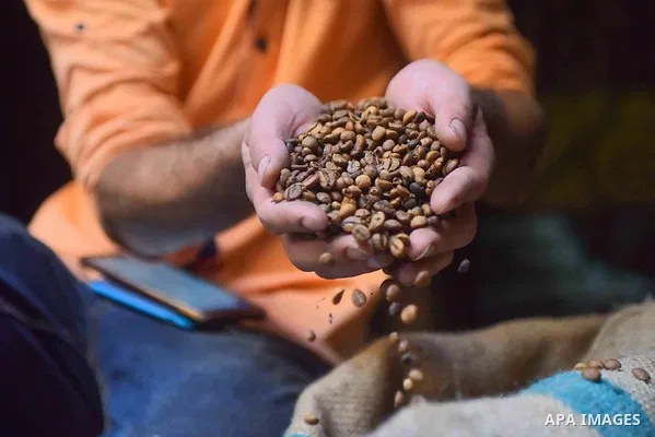 An Egyptian man makes a coffee at a factory, in Cairo, Egypt on October 11, 2016. The shop of Abdul Salam Al-banan is one of the oldest shops of the coffee industry in Egypt. Photo by Amr Sayed