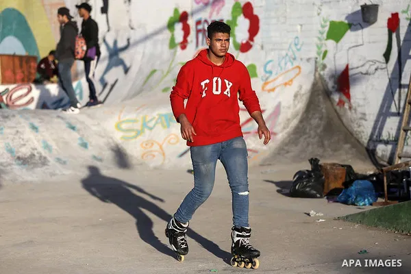 Palestinians ride skateboards during a training at Gaza seaport, on January 06, 2020 Skateboarding is an action sport which involves riding and performing tricks using a skateboard, as well as a recreational activity, an...