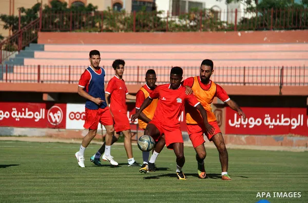 Palestinian players of Hilal al-Quds football club participate the final training session before their first leg match of the Palestine Cup final with Shabab Khan Younis football club at the Palestine Stadium in Gaza Cit...
