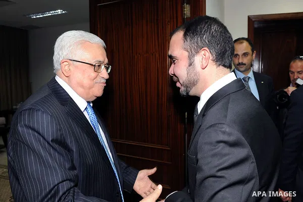 Palestinian President Mahmoud Abbas (Abu Mazen) during a meeting with the prime FIFA World Football Federation, Mr. Blatter, and Prince Ali bin Hussein, head of the Jordanian Federation of football in the west bank city...