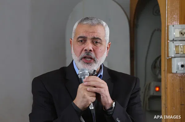 Senior Hamas leader Ismail Haniyeh speaks during the funeral of Palestinian Hamas militants whom killed when a tunnel collapse on Tuesday, during his funeral in the village of Al-Moghraga near central Gaza Strip, Februar...
