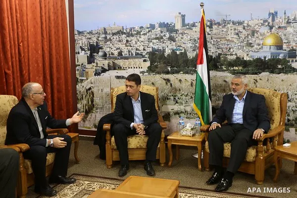 FIFA's senior development manager for Asia, David Borja meets with senior Hamas leader Ismail Haniyeh during his visit to the Gaza Strip, in Gaza city on January 6, 2015 in Gaza City. Borja, along with a delegation from...