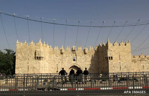 Israeli security forces stand guard during an annual march marking Israel's 1967 seizure of the Palestinian-dominated eastern half of Jerusalem, outside Damascus Gate in Jerusalem's old city on June 5, 2016. Israel occup...
