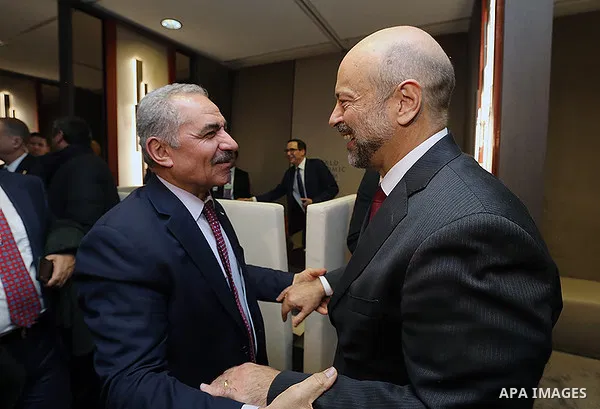 Palestinian Prime Minister Mohammad Ishtayeh, meets with World Economic Forum President Burg Brende, in Davos, Switzerland, on January 22, 2020. Photo by Prime Minister Office