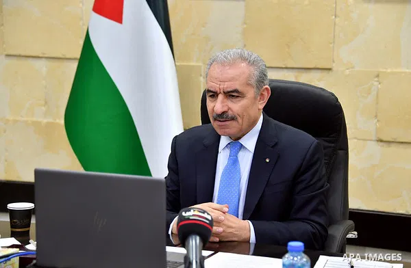 Palestinian Prime Minister Mohammad Ishtayeh, speaks during his speech on the fifth anniversary of the establishment of the Jerusalem Foundation and Endowment Fund, in the West Bank city of Ramallah, on August 19, 2020....
