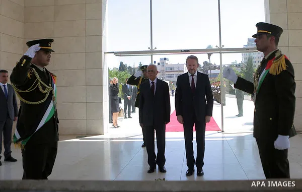 Chairman of the Tripartite Presidency of Bosnia and Herzegovina Bakir Izetbegovic lays a wreath at the tomb of late Palestinian leader Yasser Arafat, in the West Bank city of Ramallah on August 29, 2018. Photo by Shadi H...