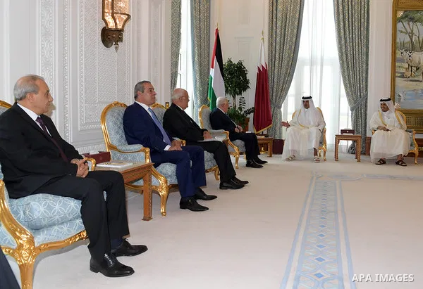 Palestinian President Mahmoud Abbas meets with Qatar Emir Sheikh Tamim bin Hamad al-Thani, in Doha, Qatar on August 9, 2018. Photo by Thaer Ganaim