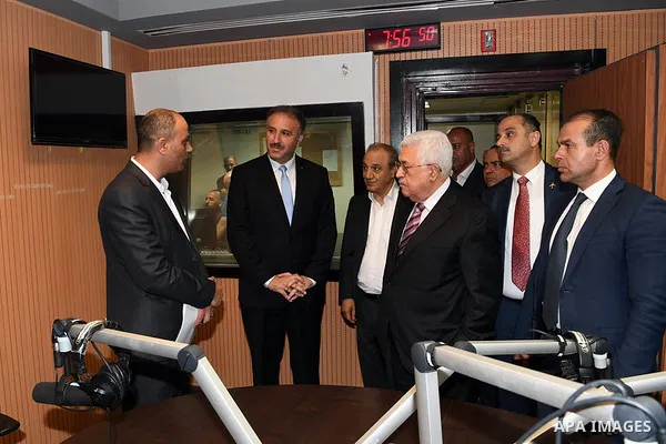 Palestinian President Mahmoud Abbas, visits the Palestinian Radio and Television in the West Bank of Ramallah on July 22, 2018. Photo by Thaer Ganaim