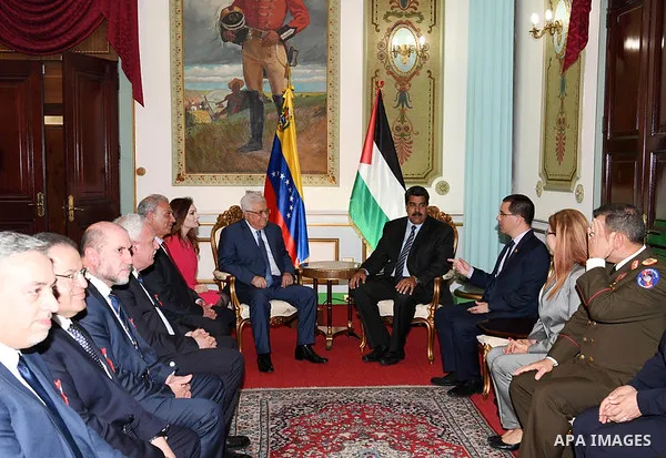 Palestinian President Mahmoud Abbas meets with Venezuelan President Nicolas Maduro at the Miraflores presidential palace in Caracas on May 7, 2018. Photo by Thaer Ganaim