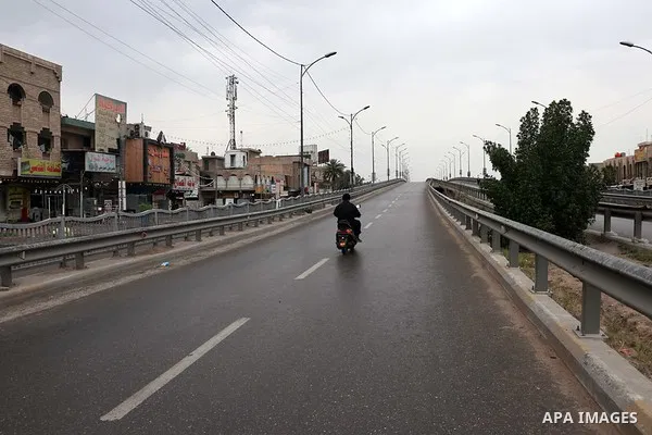 A view shows streets almost deserted during a home confinement order as a precaution against the spread of the coronavirus disease (COVID-19) in Baghdad, Iraq, on Marchl 27, 2020. Photo by Anas Jomaa