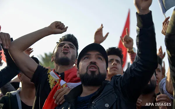 Iraqi protesters take part in an anti-government demonstration in Iraq's southern city of Nasiriyah in Dhi Qar province, on February 28, 2020. Photo by Wadaa al-Aumry